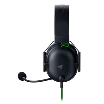 Close-up of the Razer BlackShark V2 X headset earcups showing the memory foam padding and closed-back design for superior noise isolation.